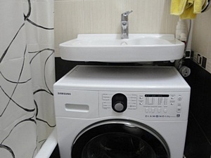 Умывальник над стиральной машиной и его особенности